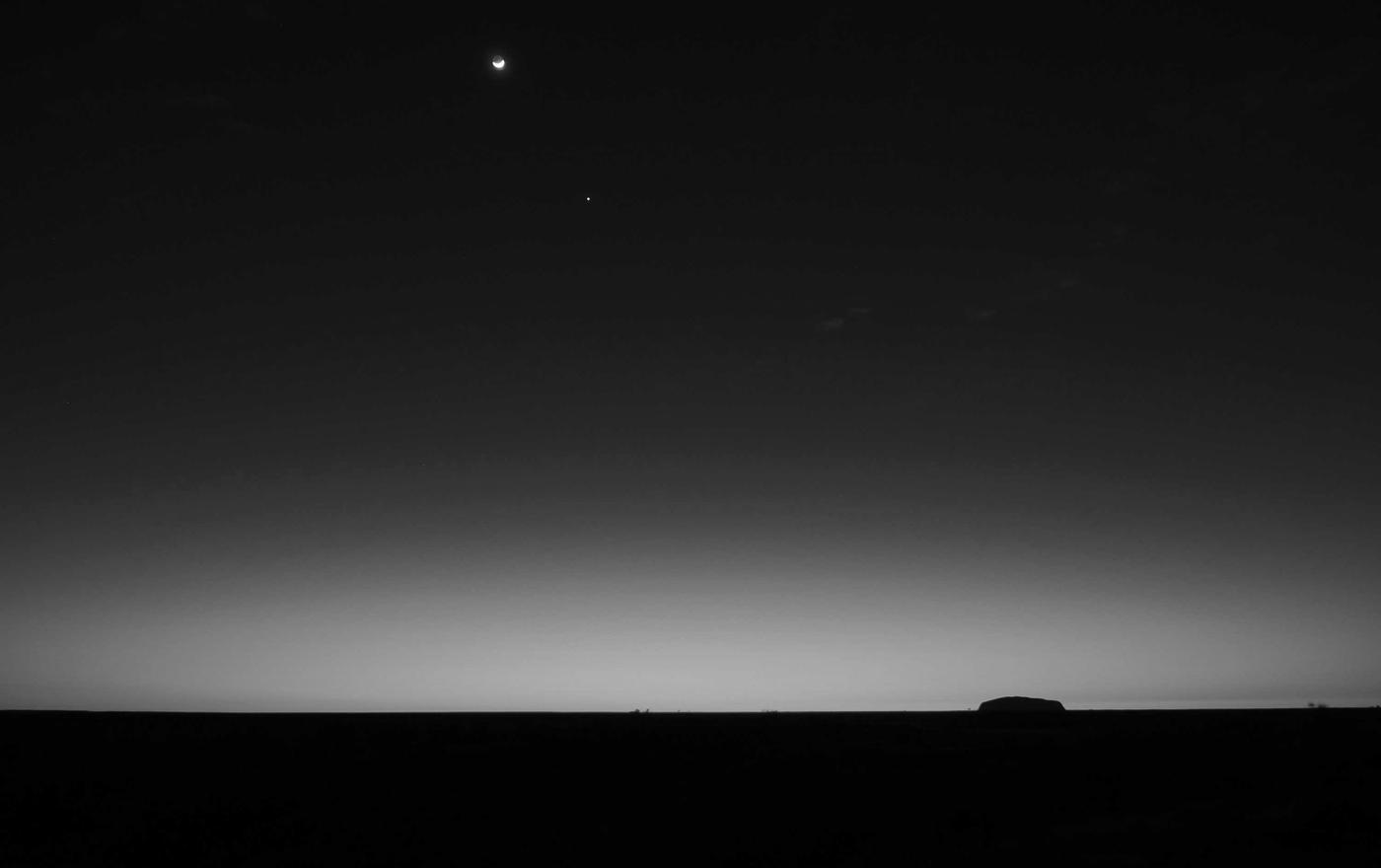 A faint horizon under a dark sky